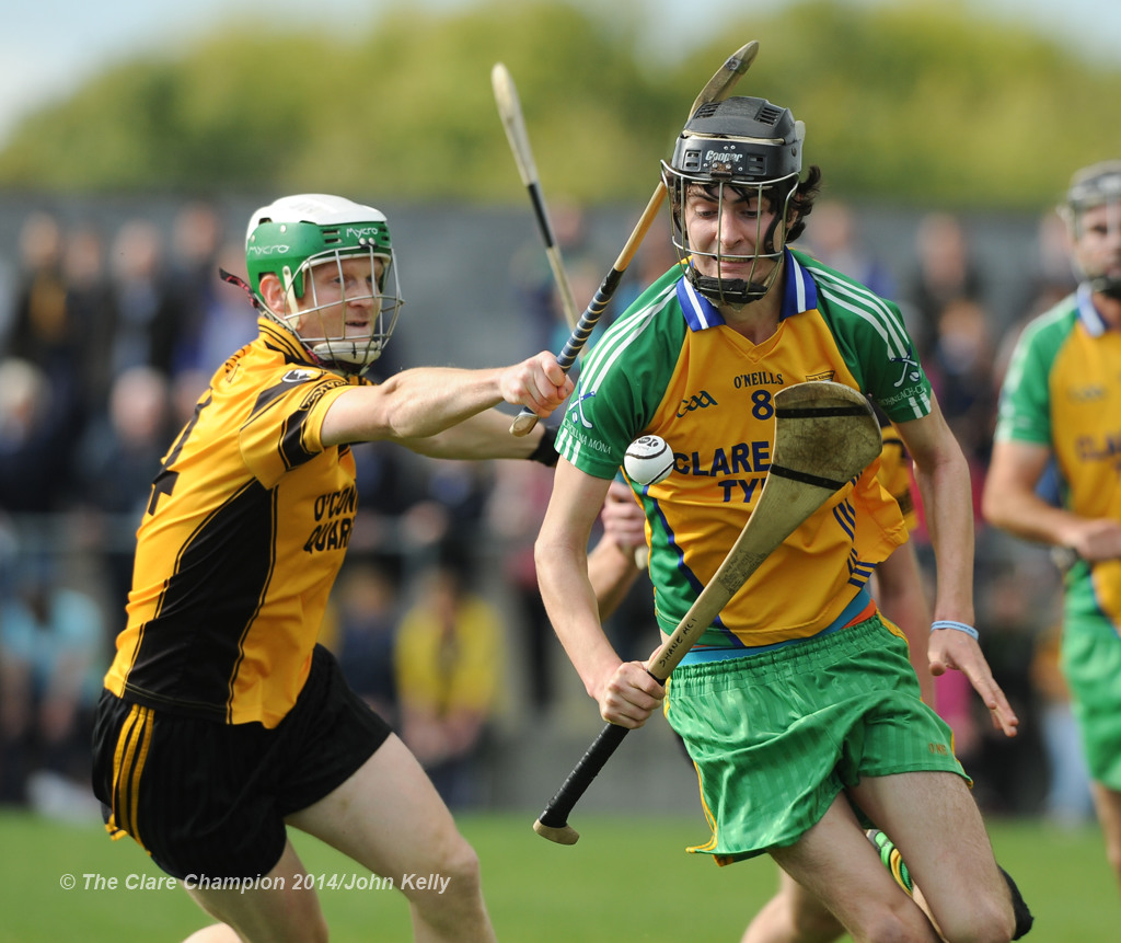 Ronan Carey of Clonlara in action against Shane Mc Inerney of Inagh-Kilnamona during their Junior A final at Clarecastle. Photograph by John Kelly.