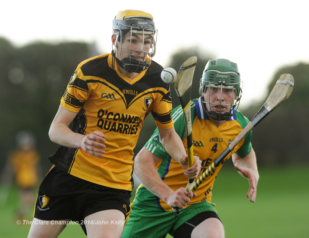 Paraic O Loughlin of Clonlara in action against Ciaran Devitt of Inagh-Kilnamona during their Junior A final at Clarecastle. Photograph by John Kelly.