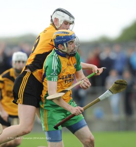 Paul O Looney of Inagh-Kilnamona in action against Ger Powell of Clonlara during their Junior A final at Clarecastle. Photograph by John Kelly.