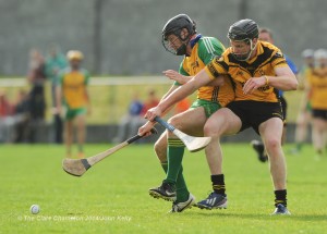 Jimmy Carmody of Inagh-Kilnamona in action against Patrick Conlon of Clonlara during their Junior A final at Clarecastle. Photograph by John Kelly.