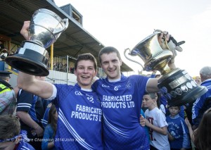 Hurling captain Liam Markham  and football captain Micheal Hawes with the two cups following their senior football final win over Eire Og at Cusack park. Photograph by John Kelly.