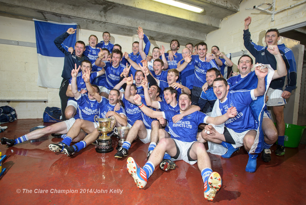 The Cratloe lads celebrate in the dressing room following their senior football final win over Eire Og at Cusack park. Photograph by John Kelly.