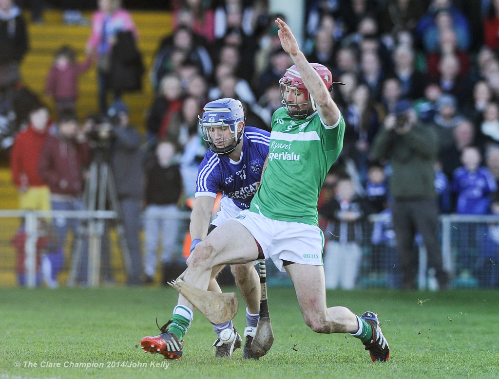 Gearoid Considine of Cratloe breaks his hurley on the knee of  Kilmallock's Paudie O Brien during their Munster Club final at The Gaelic Grounds. Photograph by John Kelly.