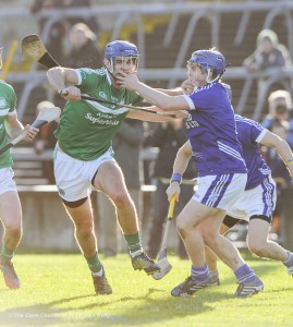 Philip O Loughlin of Kilmallock in action against Podge Collins of Cratloe during their Munster Club final at The Gaelic Grounds. Photograph by John Kelly.