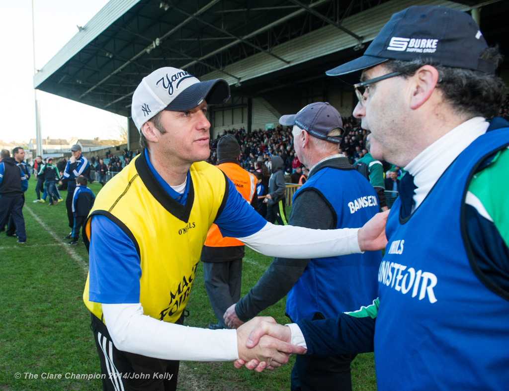 Defeated Cratloe selector Alan Neville and victorious Kilmallock manager Ger Sparrow O Loughlin, both Clarecastle natives, meet following their Munster Club final at The Gaelic Grounds. Photograph by John Kelly.