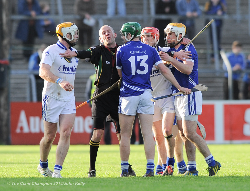 Referee Cathal Mc Allister moves to break up players from Cratloe and Thurles Sarsfield's during their Munster Club quarter final in Cusack park. Photograph by John Kelly.