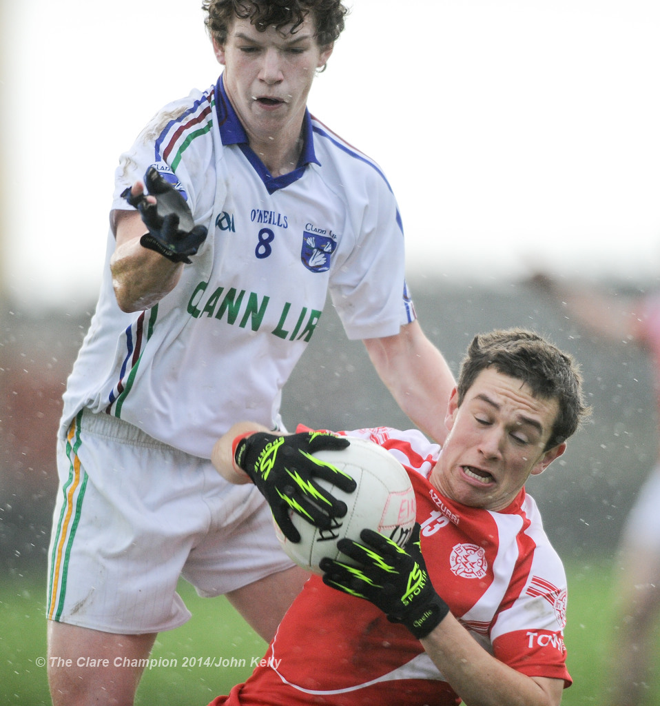 David Reidy of Eire Og in action against Jack O Dea of Clann Lir during the  U-21A final in Miltown Malbay. Photograph by John Kelly.