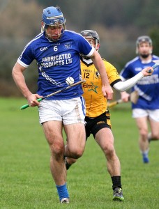 Cratloe's Conor Ryan gets away from from Clonlara's Cathal O'Connell. Photograph by Arthur Ellis.