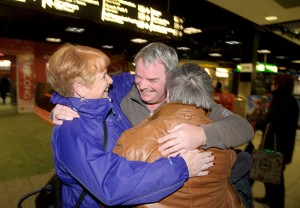 Shawn O Rourke is welcomed home for Christmas from England by his siblings, Deirdre and Brian O' Rourk. Photograph by John Kelly.