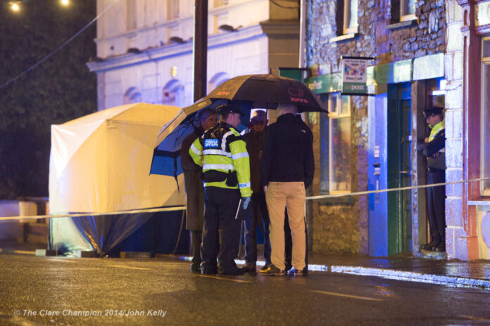 Gardaí at the scene in Kildysart on Wednesday. Photograph by John Kelly.