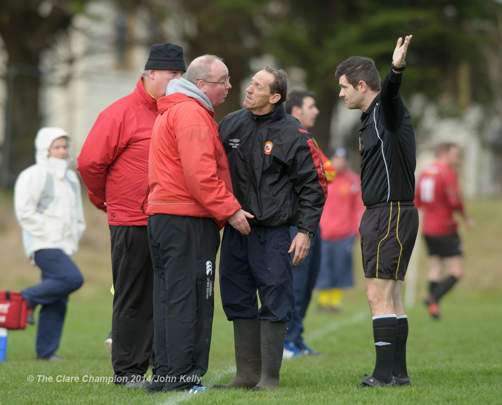 Pat Mc Daid, manager of Avenue United A  is sent away by referee James Ferns during their Premier League game against Bridge United A at Roslevan. Also in the picture is Avenue's Noel Purtill. Photograph by John Kelly.