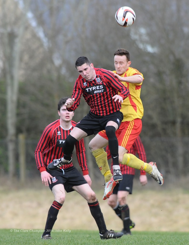 Jason White of Bridge United A in action against Mike Mahoney of Avenue United A during their Premier League game at Roslevan. Photograph by John Kelly.