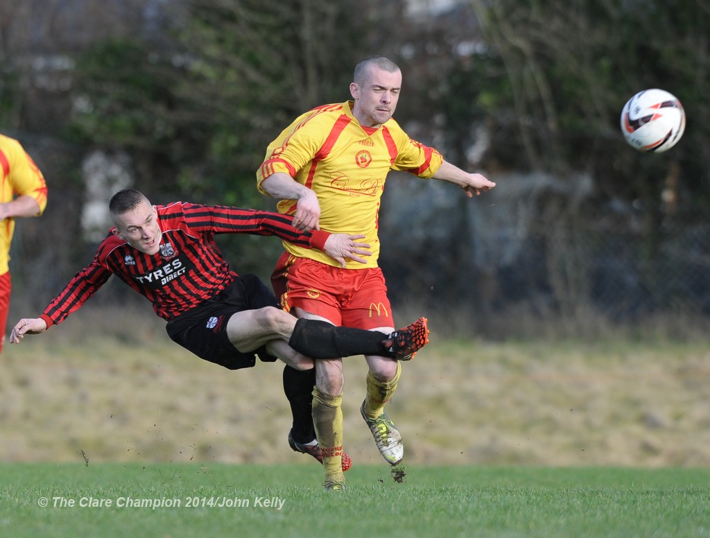 Mike Mc Namara of Bridge United A in action against Barry Nugent of Avenue United A during their Premier League game at Roslevan. Photograph by John Kelly.