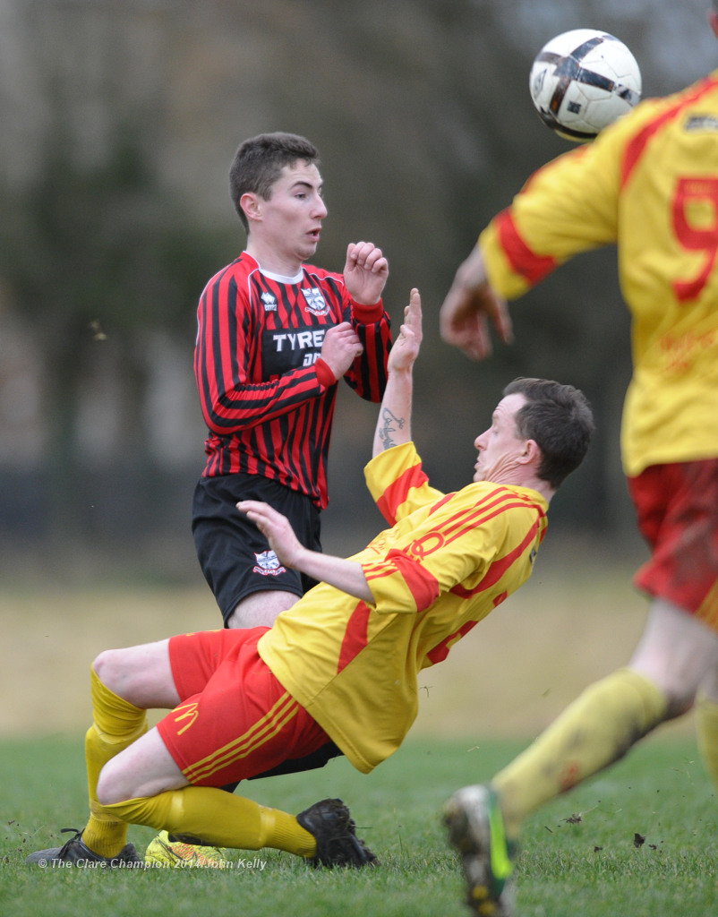 Eric Carr of Bridge United A in action against Rory Norby of Avenue United A during their Premier League game at Roslevan. Photograph by John Kelly.