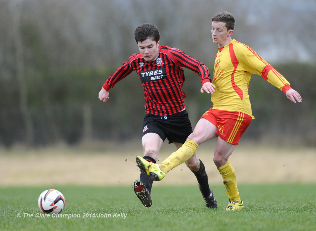 Darragh Fitzgerald of Bridge United A in action against Mark Roche of Avenue United A during their Premier League game at Roslevan. Photograph by John Kelly.