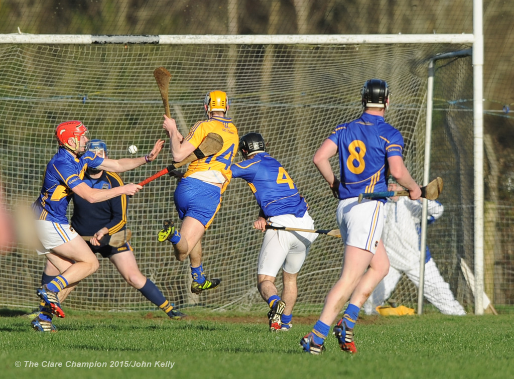 Aaron Cunningham of Clare is denied a goal chance by the Tipperary defence during their Waterford Crystal Cup game at Sixmilebridge. Photograph by John Kelly.