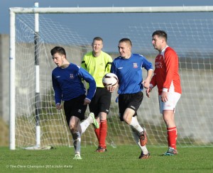 Mike Mc Namara of Bridge United  retrieves the ball after scoring a late first goal against Newmarket Celtic during their top of the table Premier League clash at Newmarket. Photograph by John Kelly.