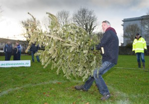 Tom Donnellan gives of his best during the annual Christmas tree throwing championships. Photograph by John Kelly.