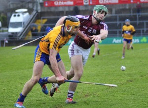 John Conlon of Clare battles for possession with Greg Lally of Galway in last weekend's encounter. Photograph by Declan Monaghan