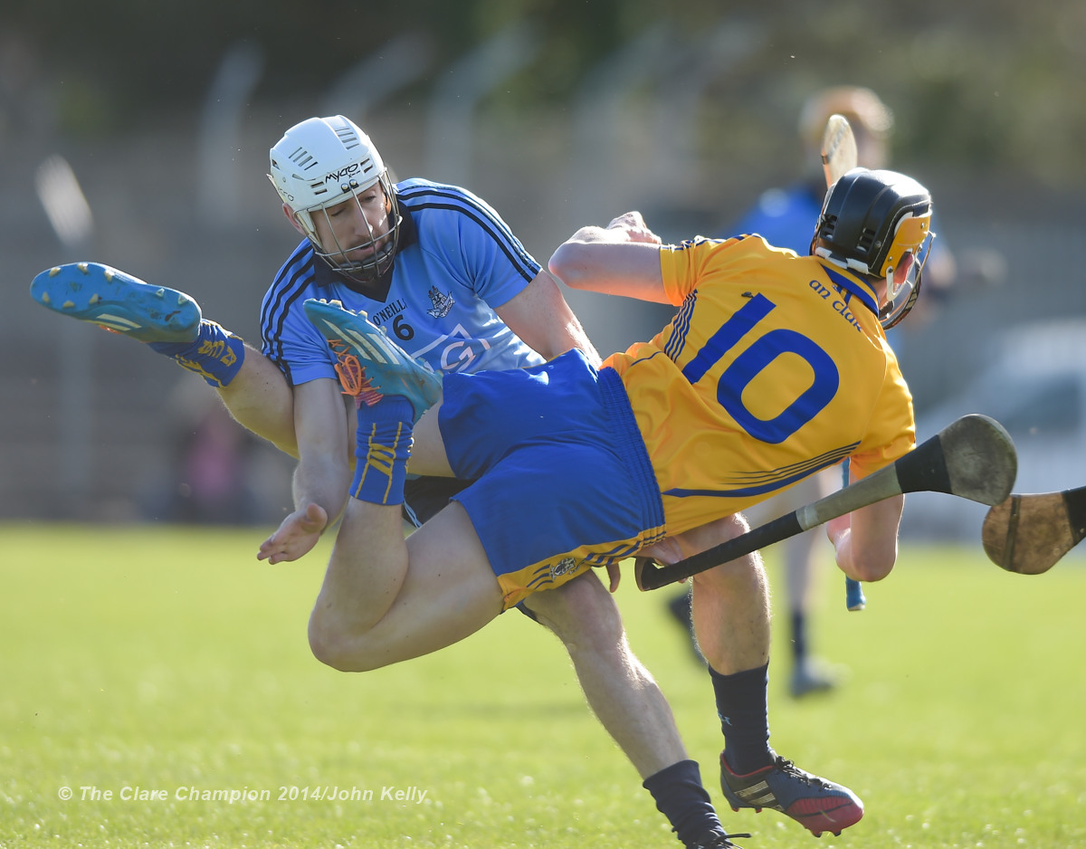 Peter Kelly of Dublin in action against John Conlon of Clare during their NHL Division 1 Round 4 game in Cusack Park. Photograph by John Kelly.