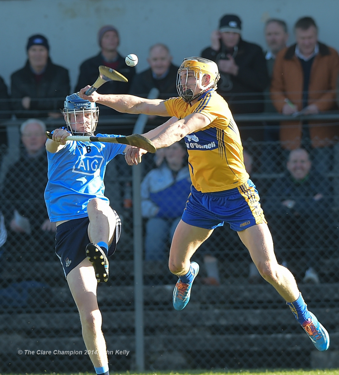 Niall Mc Morrow of Dublin in action against John Conlon of Clare during their NHL Division 1 Round 4 game in Cusack Park. Photograph by John Kelly.