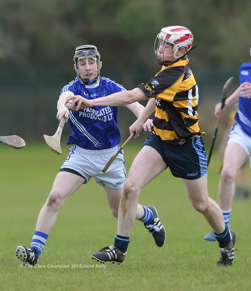 Shane O’ Leary of Cratloe in action against Gavin O’ Brien of Crusheen-Tubber during their U-21 semi final at Clarecastle. Photograph by John Kelly.