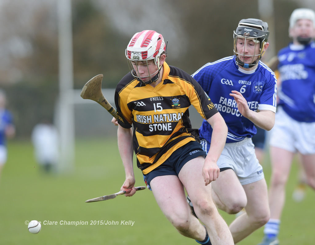 Gavin O’ Brien of Crusheen-Tubber in action against Shane O’ Leary of Cratloe during their U-21 semi final at Clarecastle. Photograph by John Kelly.