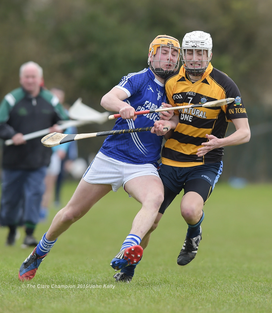 Shane Gleeson of Cratloe  in action against Francis McCormack of Crusheen-Tubber during their U-21 semi final at Clarecastle. Photograph by John Kelly.