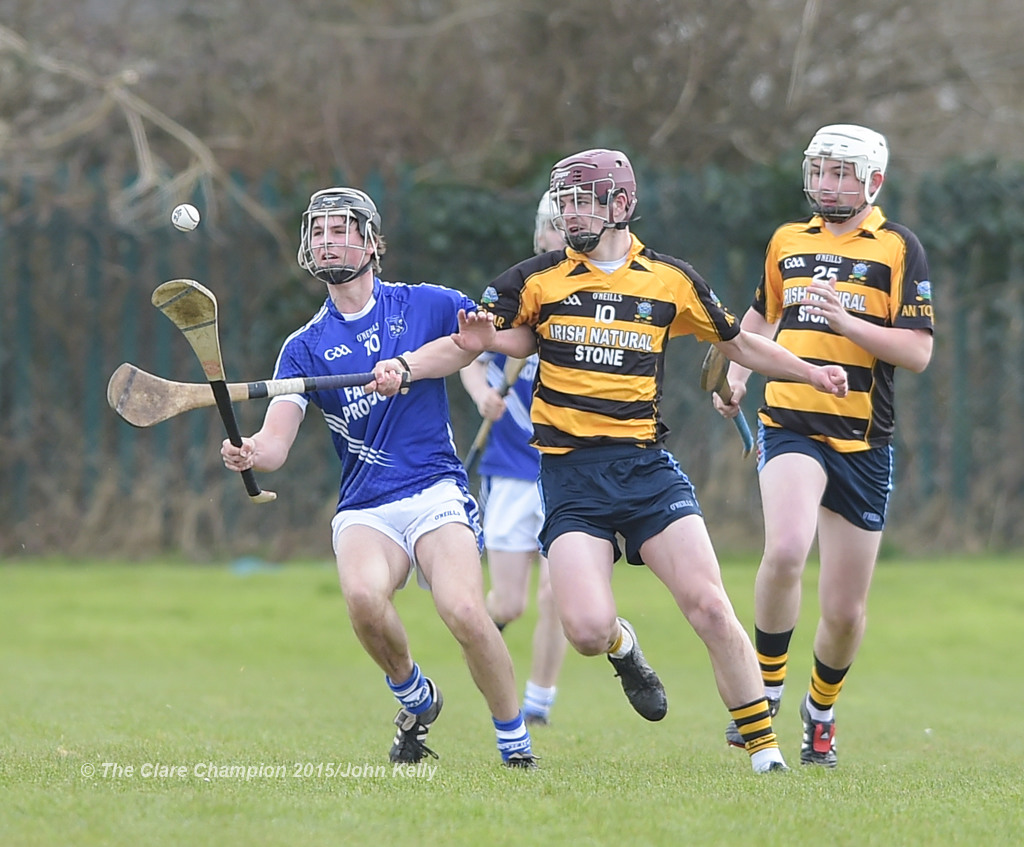 Michael Danaher of Cratloe  in action against James Howard of Crusheen-Tubber during their U-21 semi final at Clarecastle. Photograph by John Kelly.