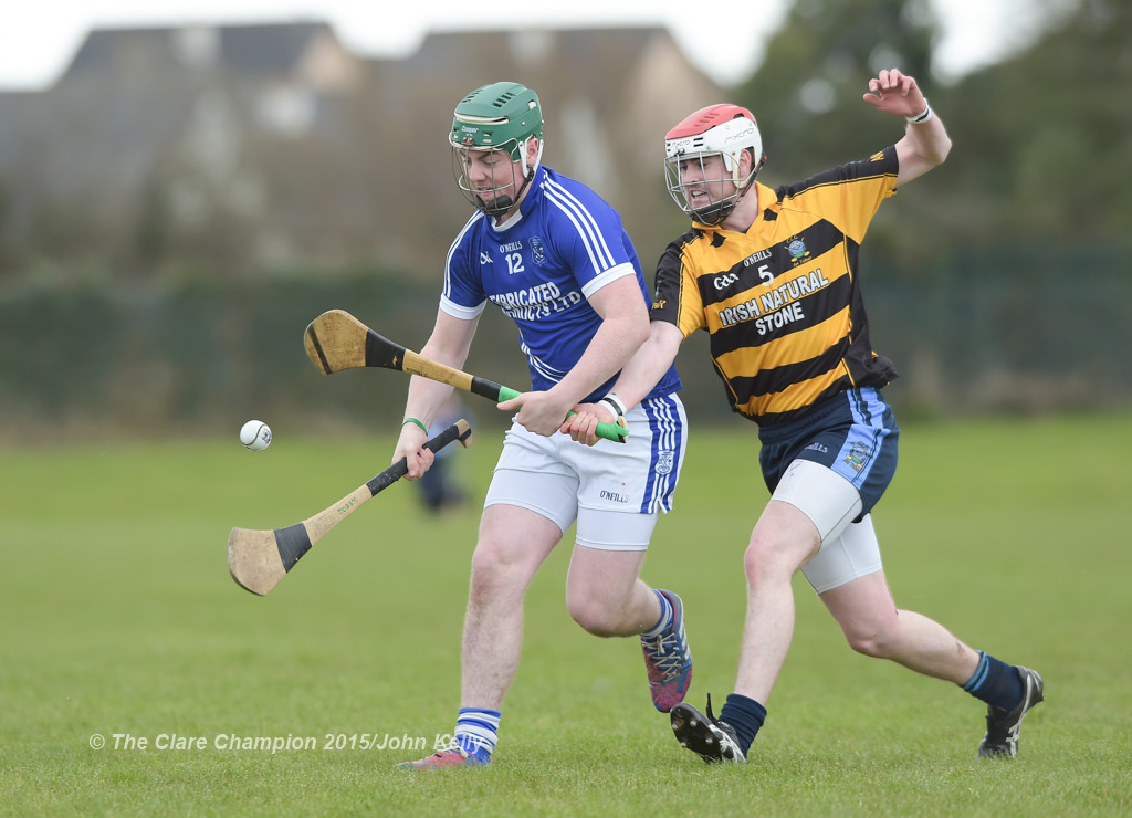 David O’ Brien of Cratloe  in action against Sean Mhaoir of Crusheen-Tubber during their U-21 semi final at Clarecastle. Photograph by John Kelly.