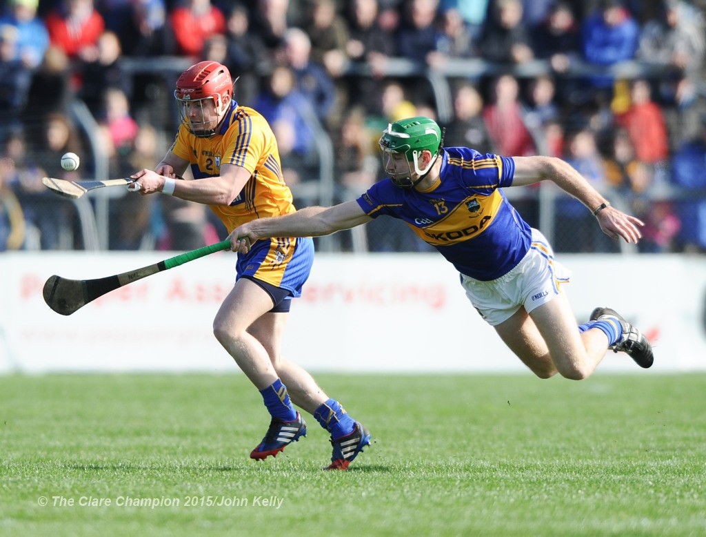 Paul Flanagan of Clare in action against Noel Mc Grath of Tipperary during their game in Cusack park. Photograph by John Kelly.