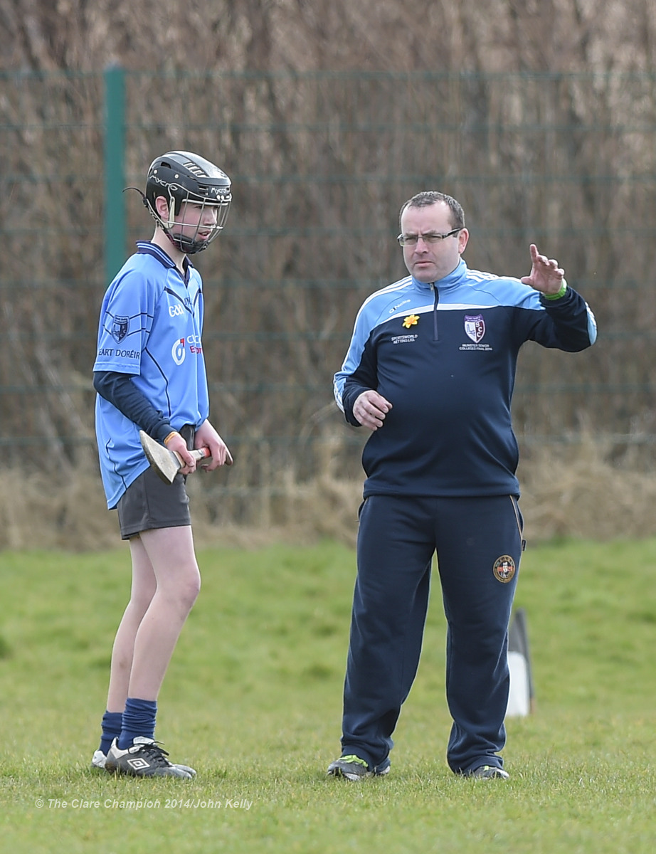 Scariff manager Sean Mc Namara with  Ronan Hayes during their game against Ennistymon CBS during their Munster U-15 D final at Clarecastle. Photograph by John Kelly.