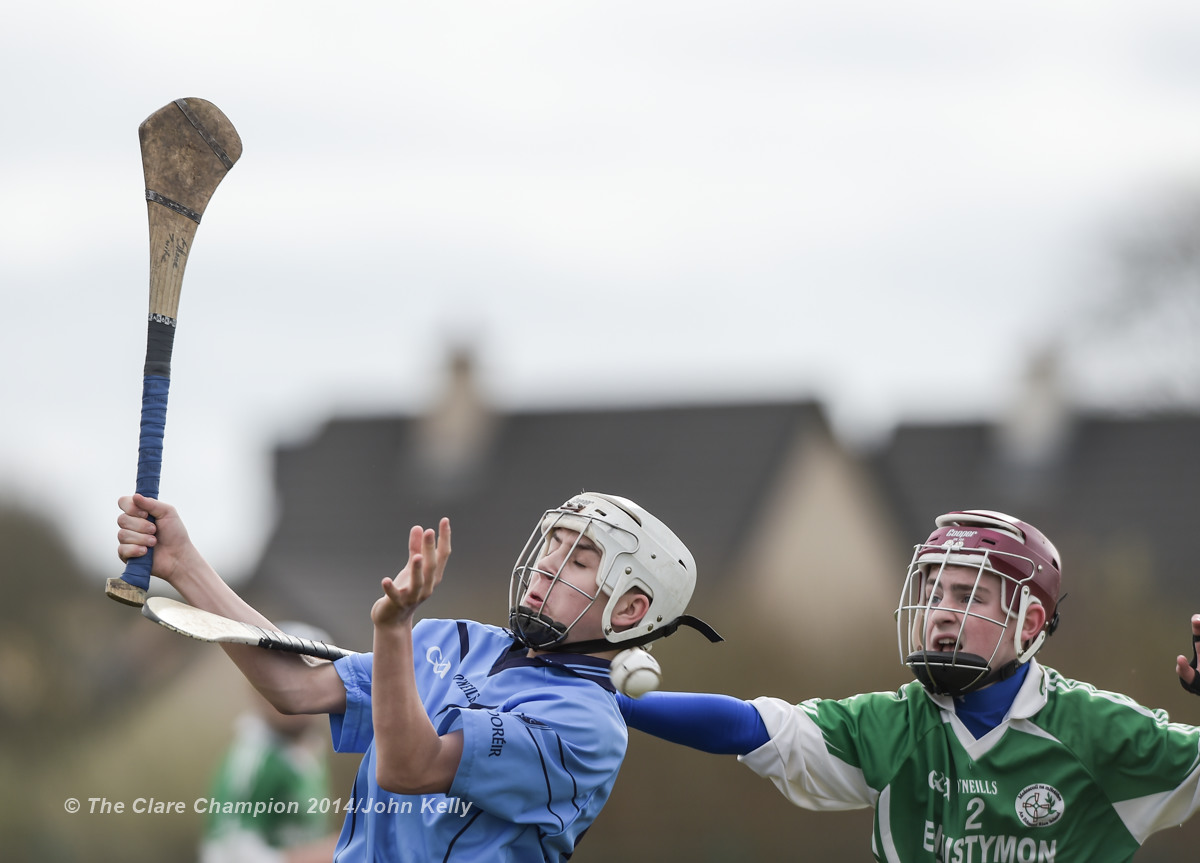 Shane Quinn Tuite of Scariff Community College  in action against Dean Lynch of Ennistymon CBS during their Munster U-15 D final at Clarecastle. Photograph by John Kelly.