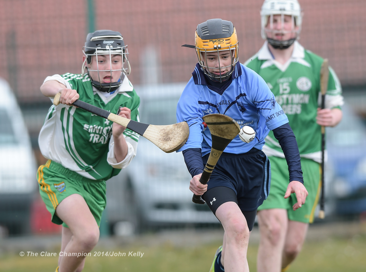 Aidan Sheedy of Scariff Community College  in action against Keelin Guiler of Ennistymon CBS during their Munster U-15 D final at Clarecastle. Photograph by John Kelly.