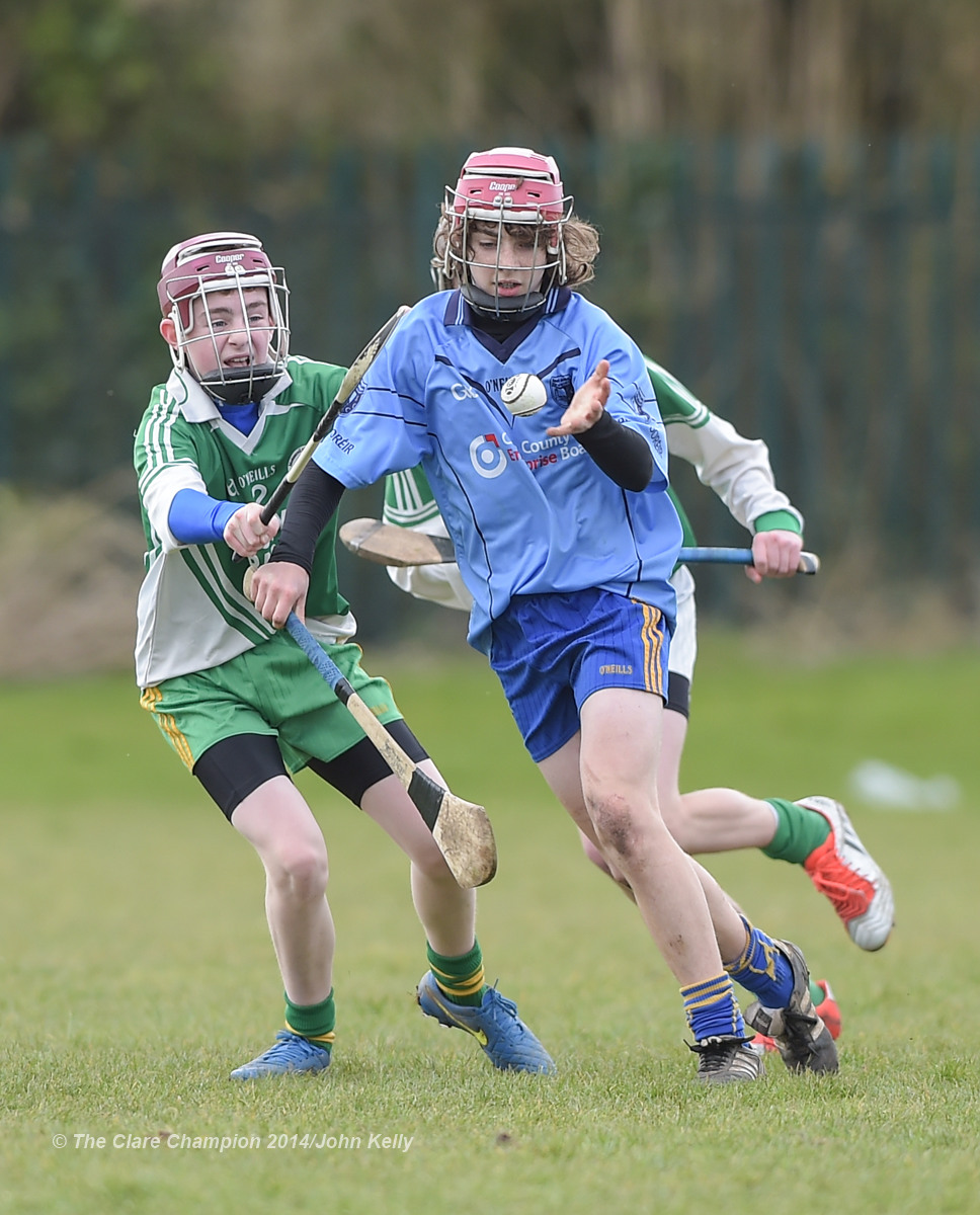 Fionn Slattery of Scariff Community College  in action against Dean Lynch of Ennistymon CBS during their Munster U-15 D final at Clarecastle. Photograph by John Kelly.