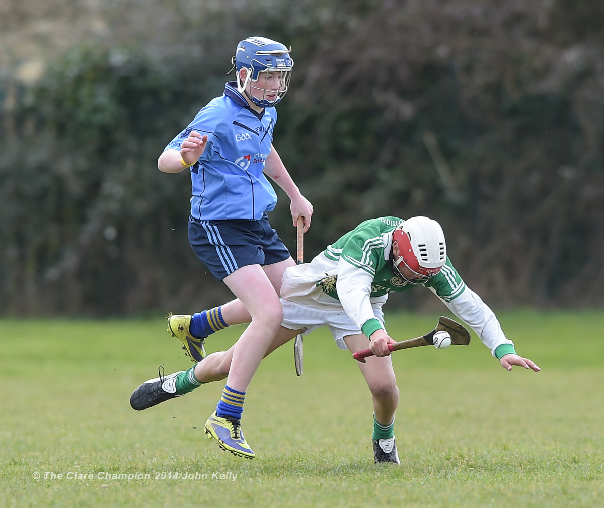 Martin Walsh of Scariff Community College  in action against Eoin Fitzgerald of Ennistymon CBS during their Munster U-15 D final at Clarecastle. Photograph by John Kelly.