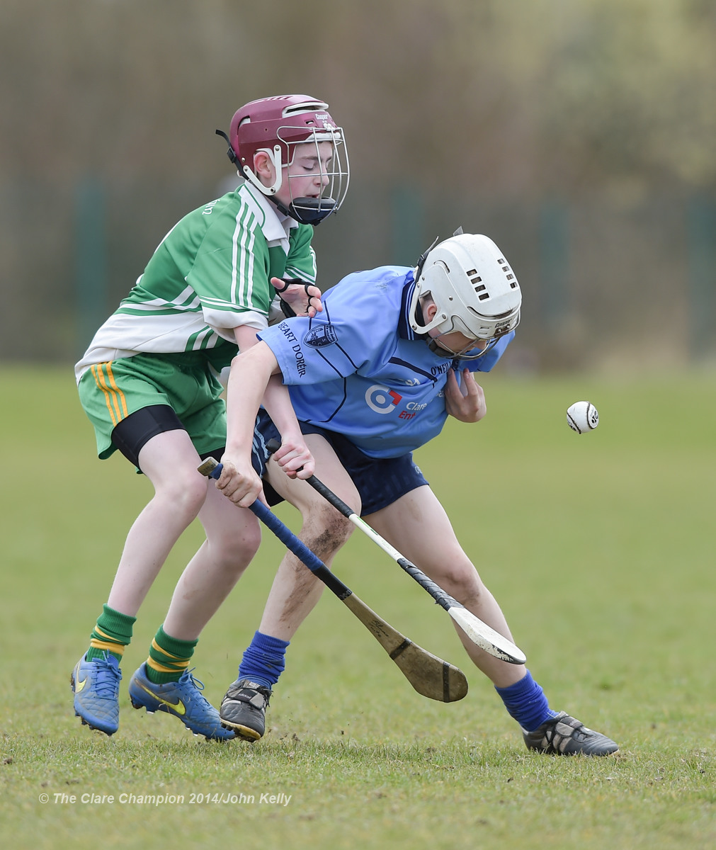 Dean Lynch of Ennistymon CBS in action against Shane Quinn Tuite of Scariff Community College during their Munster U-15 D final at Clarecastle. Photograph by John Kelly.