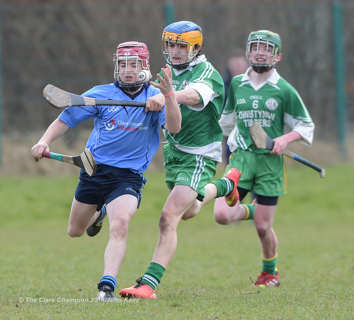 Conor Downes of Scariff Community College  in action against Aidan Mc Carthy of Ennistymon CBS during their Munster U-15 D final at Clarecastle. Photograph by John Kelly.