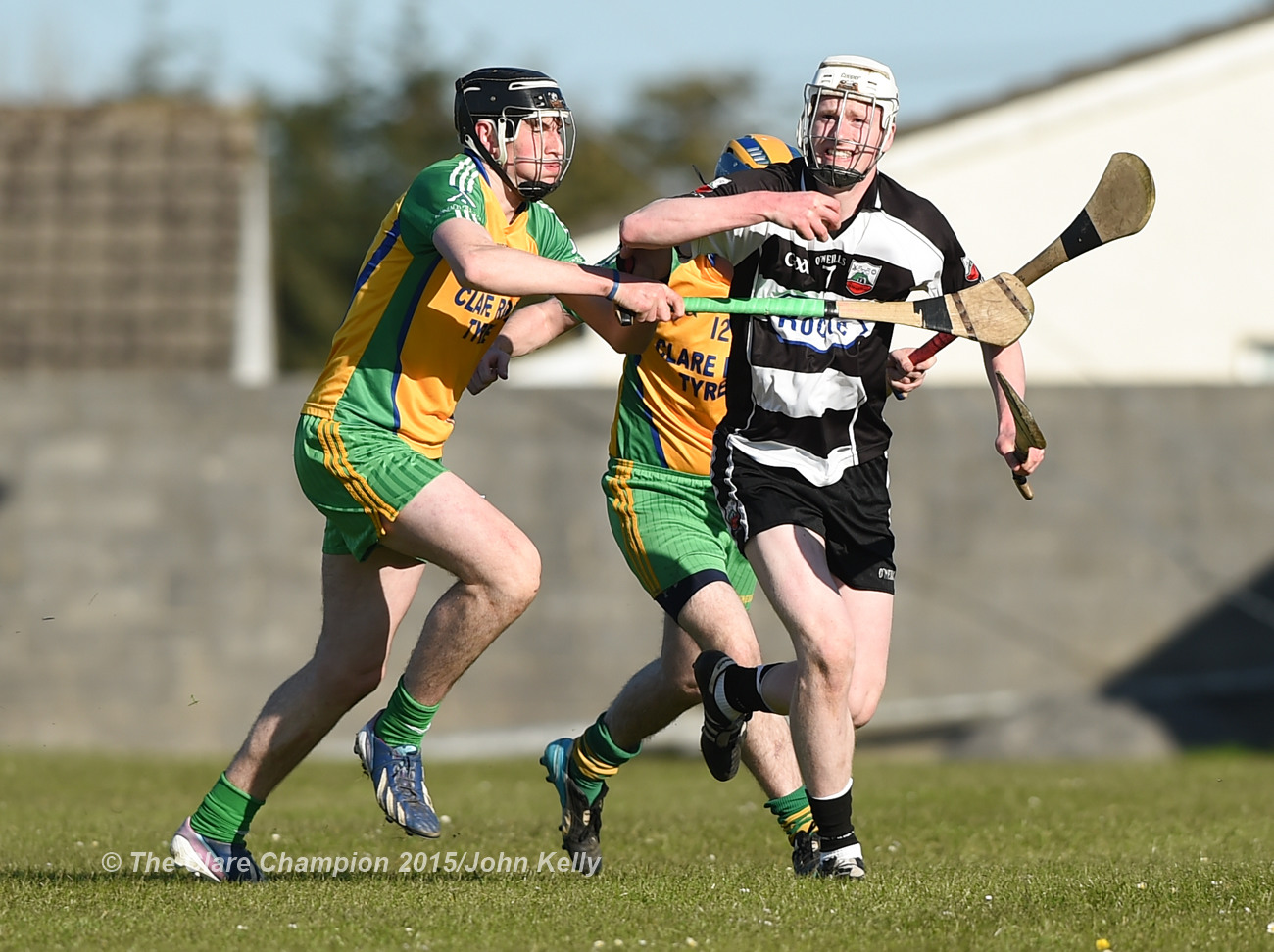 David Fitzgerald of Inagh-Kilnamona in action against Conor Galvin of Clarecastle during their Clare Champion Cup game in Inagh. Photograph by John Kelly.