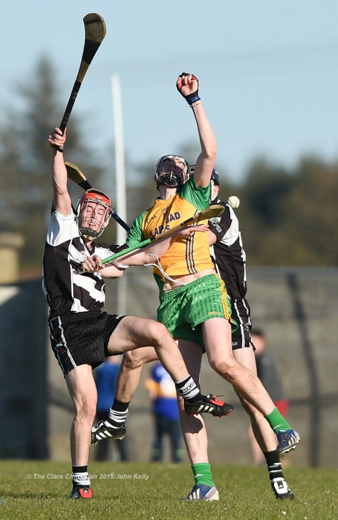 Gearoid Ryan of Clarecastle in action against David Fitzgerald of Inagh-Kilnamona during their Clare Champion Cup game in Inagh. Photograph by John Kelly.