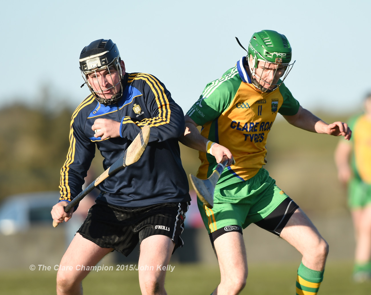 Johnathan Griffey of Clarecastle in action against Conor Tierney of Inagh-Kilnamona during their Clare Champion Cup game in Inagh. Photograph by John Kelly.