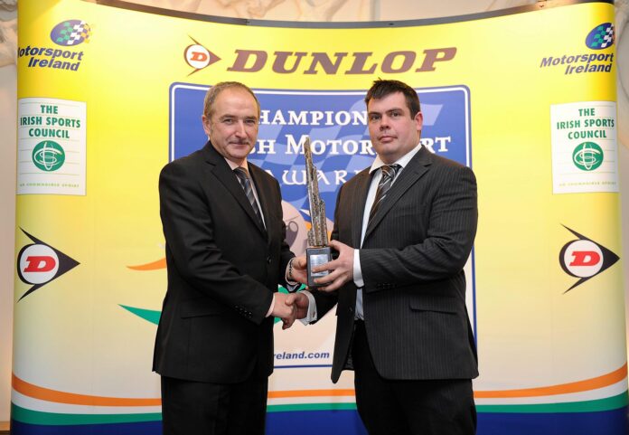 Simon McKinley (on right) being presented with the 2010 Connaught Competition Engines Irish Hillclimb and Sprint trophy by Joe Corcoran (President of Motorsport Ireland).