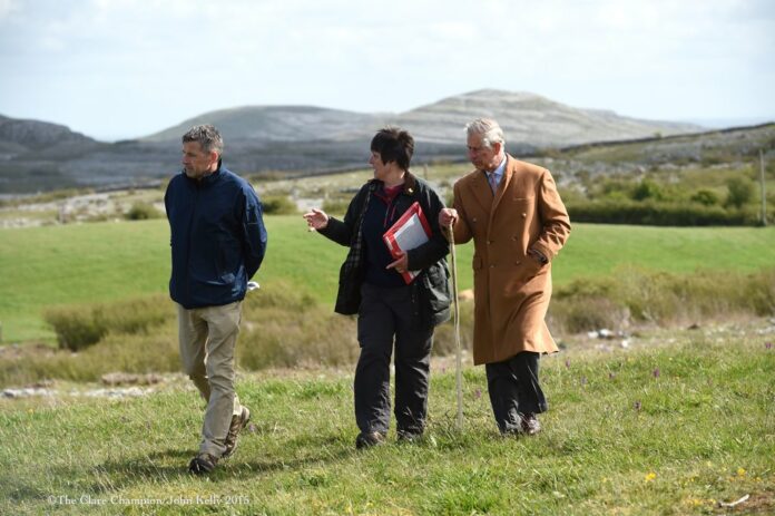 Prince Charles takes a stroll through the famous Burren landscape this afternoon, with Dr Brendan Dunford, Burrenbeo project manager and Dr Sharon Parr, also of Burrenbeo. Photograph by John Kelly.