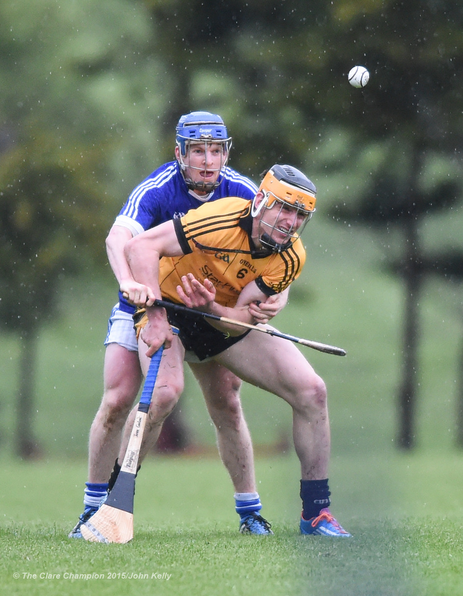 John Conlon of Clonlara in action against Podge Collins of Cratloe during their Clare Champion Cup game at Cratloe. Photograph by John Kelly.