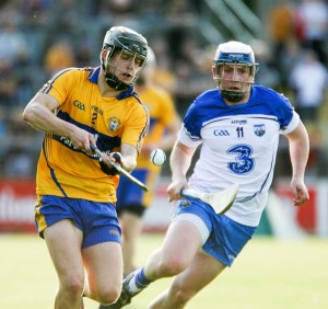 Eoin Quirke keeps possession ahead of Stephen Bennett. Photograph Arthur Ellis