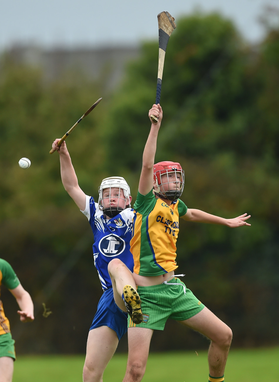 Kilmaley's Darragh Hickey in action against Keith White of Inagh-Kilnamona during their U-16A hurling final.