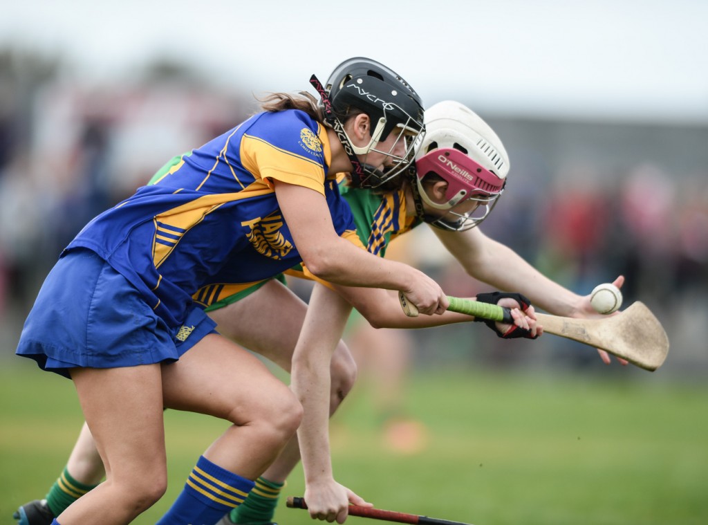 Newmarket's Niki Kaiser in action against Inagh-Kilnamona's Clare Hehir during the Mc Mahon Senior Camogie cup final at Clarecastle. Photograph by John Kelly.