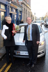 To mark the 50th anniversary of her victory in The Tulip Rally in 1965, Rosemary Smith announced the winning car in the 2016 Continental Irish Car of the Year Awards. She is pictured with the winning car, the Ford Mondeo, along with Irish Motoring Writers' Association Chairman, John Galvin.