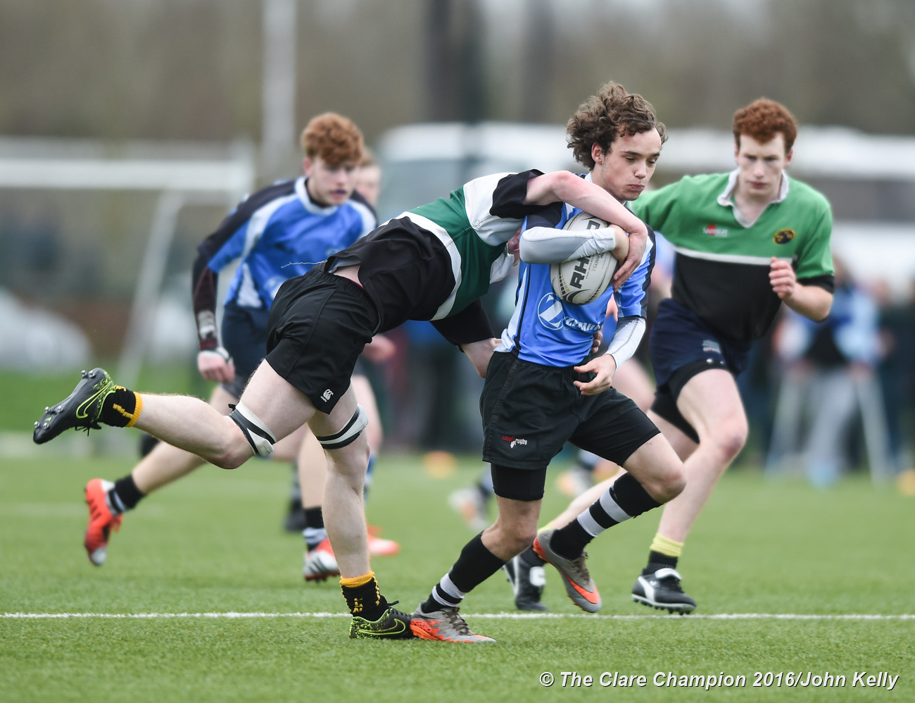 Darren O Loughlin of St Caimin's in action against Abbey CBS.