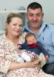 New Year baby, Paddy O'Grady with his proud parents, Lynette and Padraig.